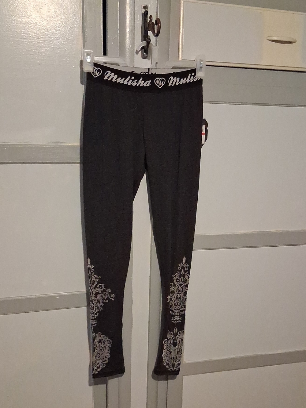 Metal Mulisha Black Leggings with White Scroll Detail
